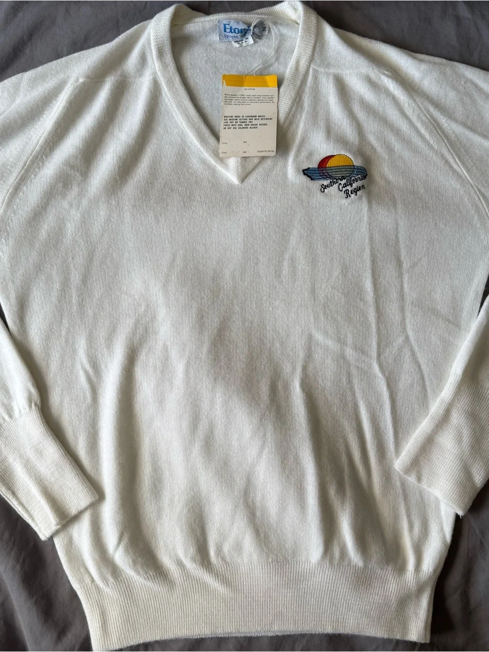 Eton White V-Neck Sweater with Sunset Crest Embroidery